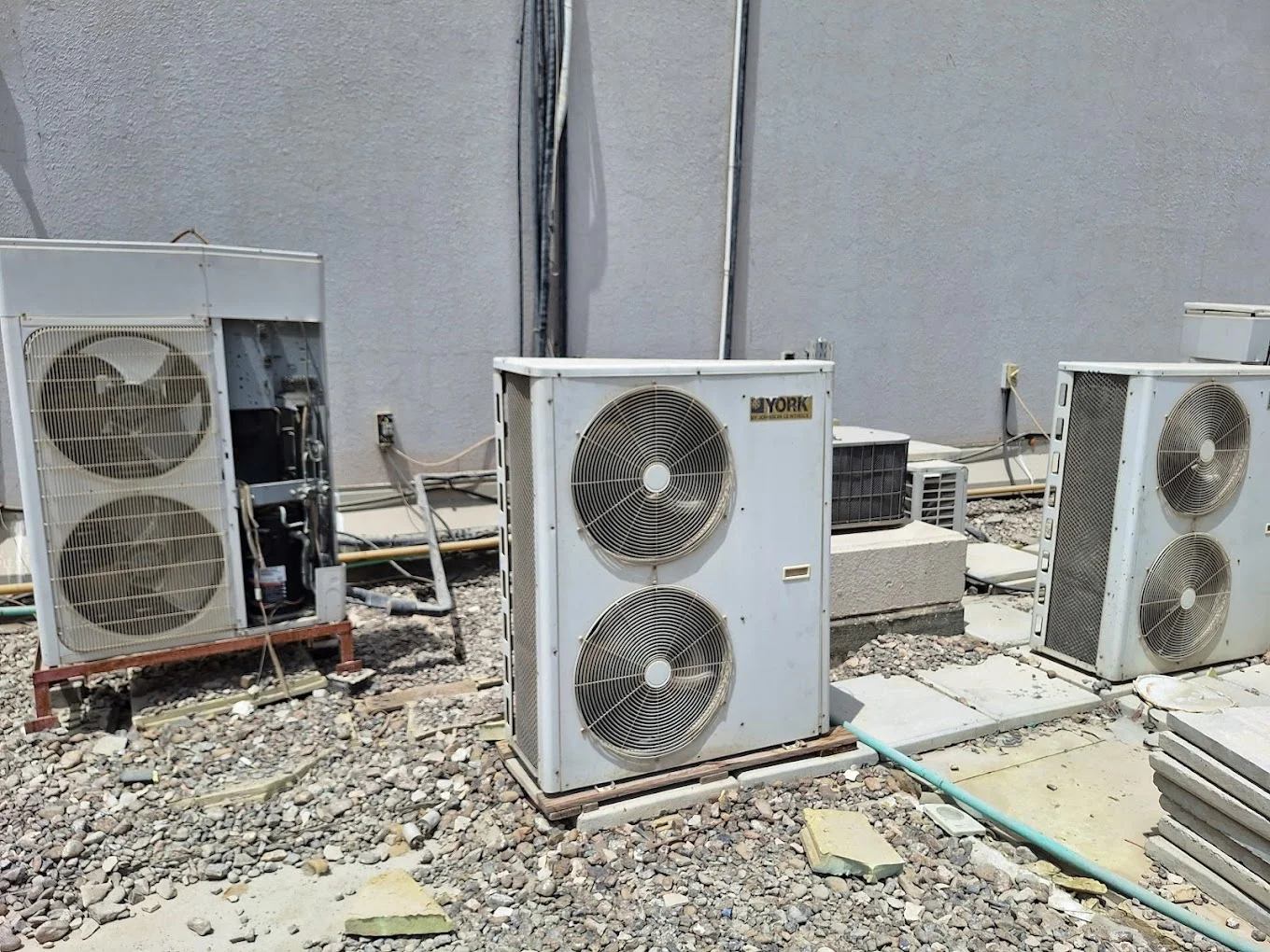 Technician checking an HVAC system with a tablet